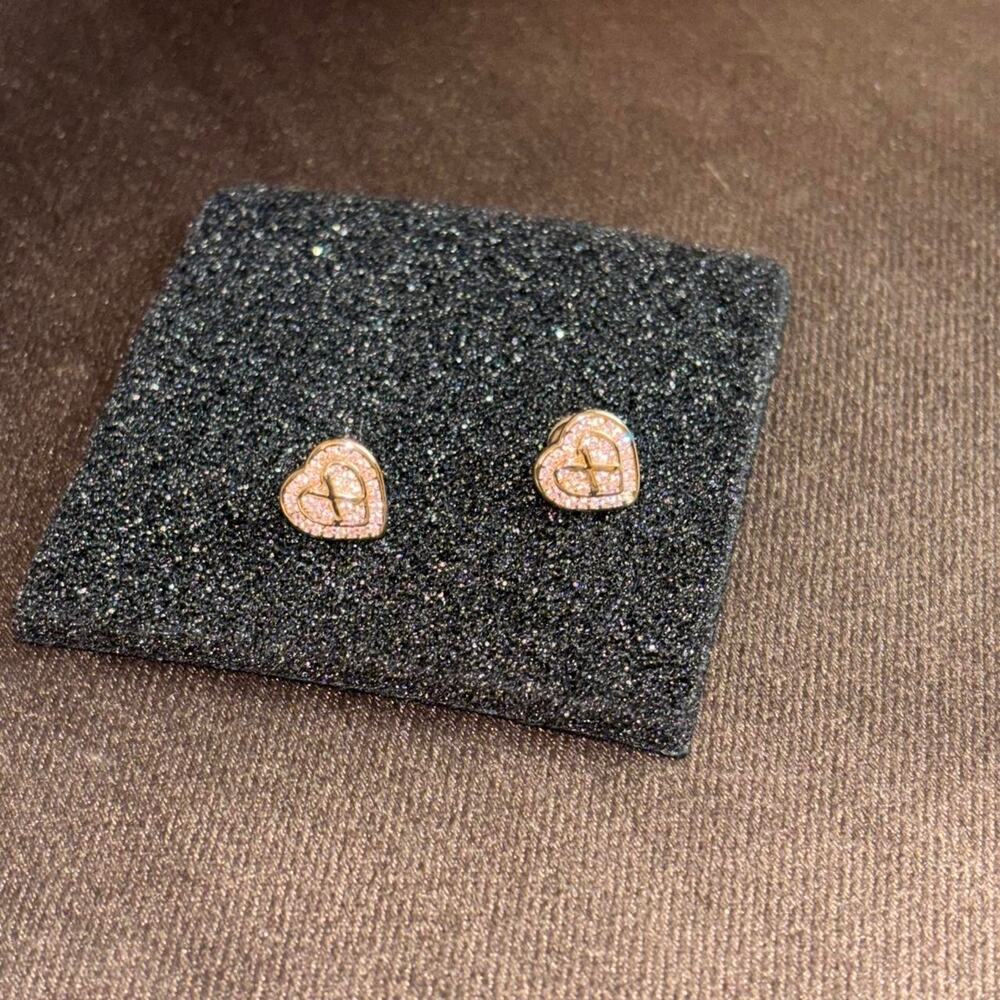Gold heart stud earrings